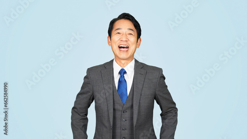 Photos 笑顔の中年ビジネスマン