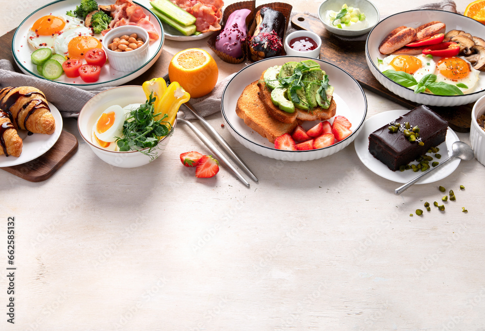 Healthy breakfast eating concept, various morning food on light background