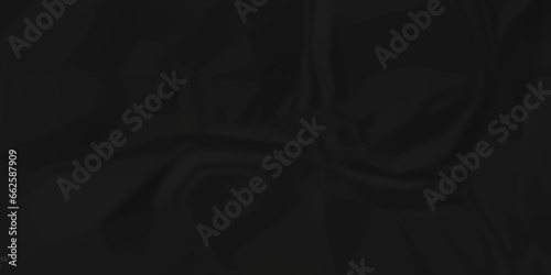 Crumpled black paper texture. Black crumpled paper texture crush paper. creased and wrinkled. Old dark black crumpled paper sheet background texture.	
