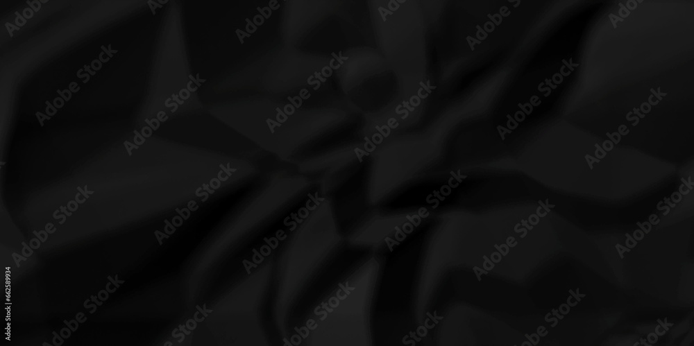 Crumpled paper texture. black crumpled paper texture. top view. crush paper so that it becomes creased and wrinkled. Old black crumpled paper sheet background texture. Crumpled paper texture. black crumpled paper texture. top view. crush paper so that it becomes creased and wrinkled. Old black crumpled paper sheet background texture.