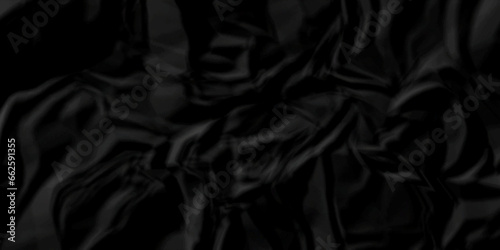 Crumpled black paper texture. Black crumpled paper texture crush paper. creased and wrinkled. Old dark black crumpled paper sheet background texture.	
