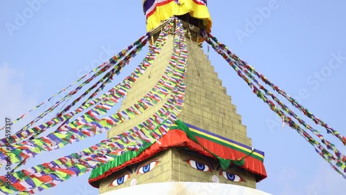 tripod shot of the Buddha Stupa Stupa located in boudhha, Kathmandu, Nepal. Calm and Spiritual ambience. photo