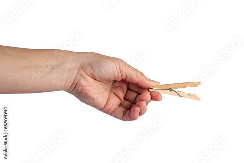 Hand and wood clothespins isolated on transparent background
