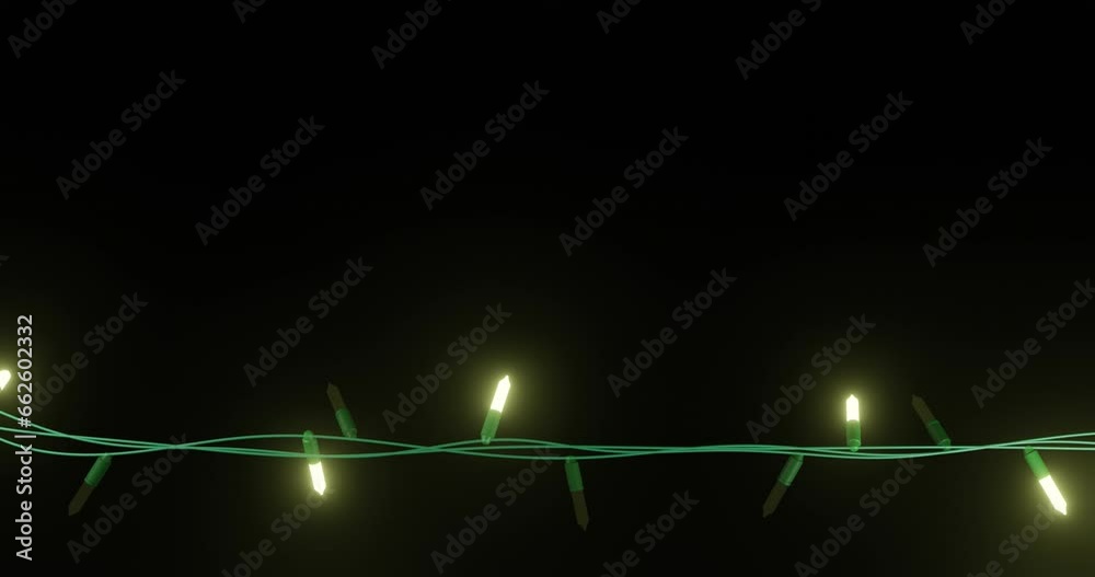 Strand of yellow christmas string lights flashing on black background, copy space