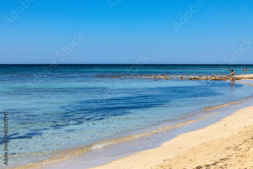 SALVE, ITALY, JULY 15, 2022 - Beautiful clear waters of Salve beach called also " The Seycelles of Salento" in Salento region, province of Lecce, Italy