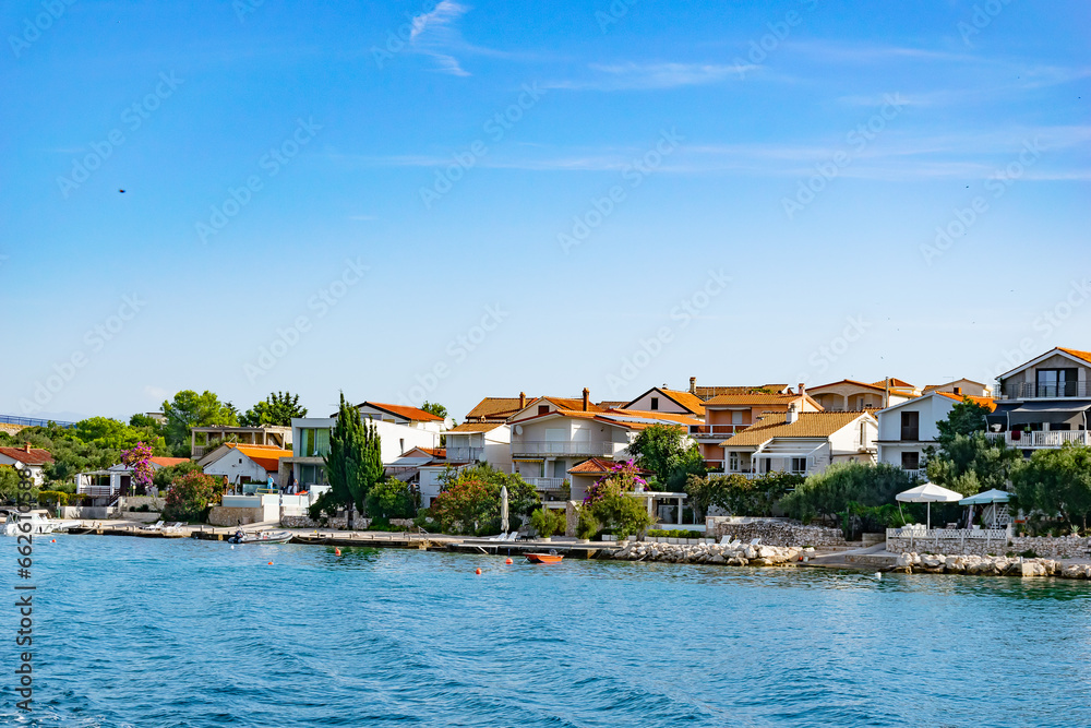 Croatian seaside town with houses with red roofs