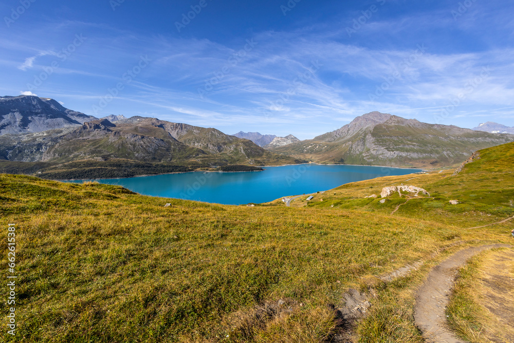 Panoramic view of the Mont-Cenis lake near the Mont-Cenis hill between the Italian Val di Susa and the French Maurienne valley, France Panoramic view of the Mont-Cenis lake near the Mont-Cenis hill between the Italian Val di Susa and the French Maurienne valley, France