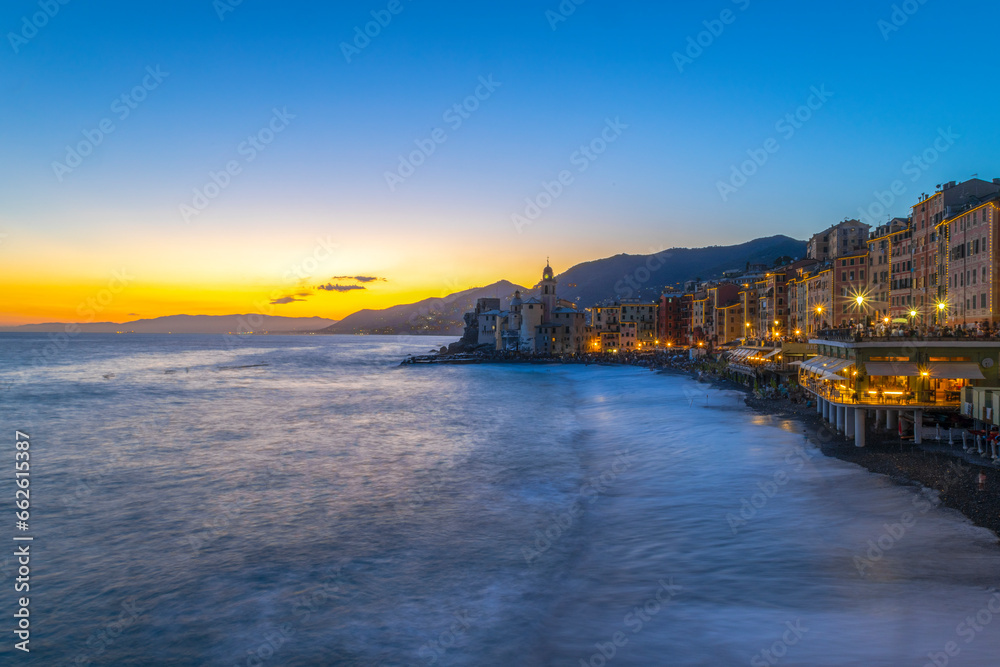 CAMOGLI, ITALY, AUGUST 6, 2023 - View of the ligurian seaside village of Camogli at dusk, province of Genoa, Italy