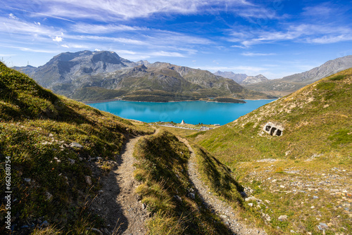 Fototapeta Naklejka Na Ścianę i Meble -  Panoramic view of the Mont-Cenis lake near the Mont-Cenis hill between the Italian Val di Susa and the French Maurienne valley, France