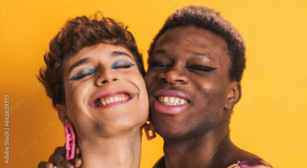 Happy transgender men smiling and embracing Happy transgender men smiling and embracing