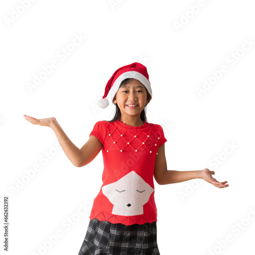Portrait of cheerful happy Asian little girl Girl in santa hat Holding hands surprise standing posing, isolated on yellow background