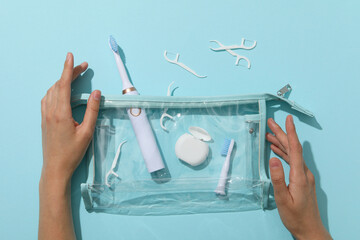 Fotobehang Tandarts Toilettas met tandenborstel en flosdraad  © Atlas
