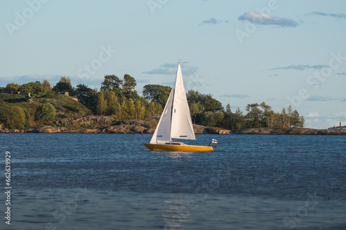 Sailboat on the Baltic Sea in a sunny autumn day in Helsinki photo