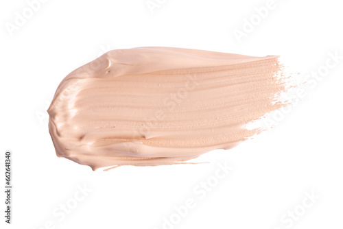 A smear of foundation cream or concealer isolated on white background, macro. Texture of cosmetic liquid foundation or beige cream smudge, smear, stroke. photo