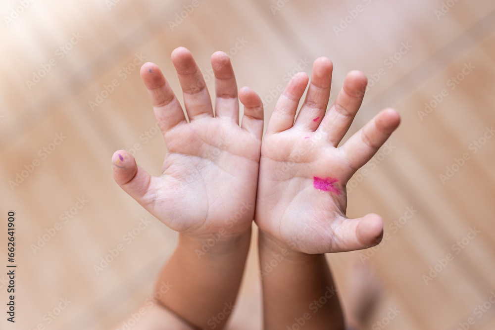 close-up of a child's hands, stained with felt-tip pens. Children's creativity concept