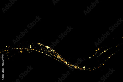 Scattered gold particles on a dark background. A wavy stream of shiny gold confetti. Festive background or design element.