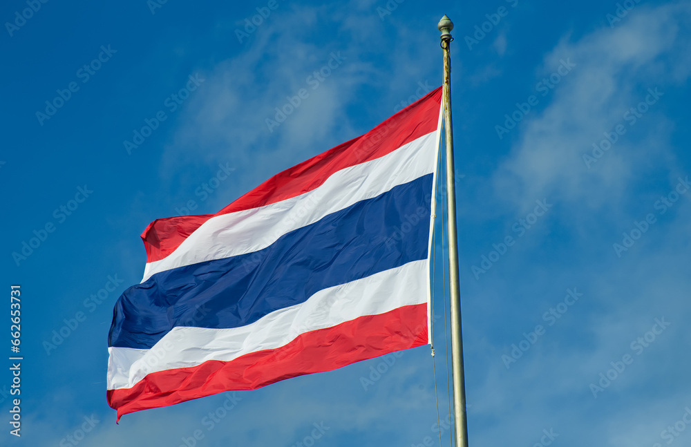 Thailand national flag against to blue sky