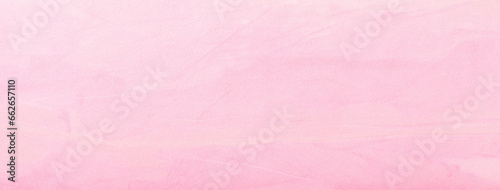 Texture of light pink and lilac colors paper background, macro. Structure of vintage rose craft cardboard.