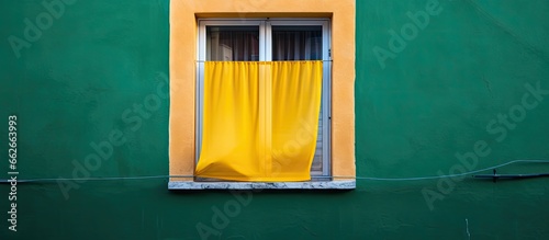 Italy s yellow house with an Italian flag With copyspace for text
