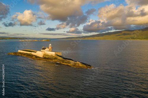 Fenit Lighthouse at sunset, Tralee, Kerry, Ireland  photo