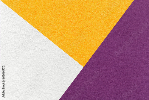 Texture of craft white, yellow and purple shade color paper background, macro. Vintage abstract violet cardboard