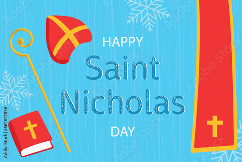St. Nicholas Day. Horizontal banner with attributes of St. Nicholas, hat, Bible, scepter on a blue wooden background decorated with snowflakes.