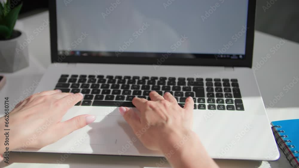 female computer user typing on the keyboard while filling out documents, close-up female computer user typing on the keyboard while filling out documents, close-up