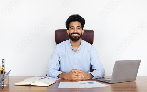 Diligent Worker Eastern Man Handling Online Business Tasks