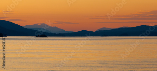 Sunset over coastal mountain landscape, Pender Island, Gulf of Georgia, British Columbia, Canada photo