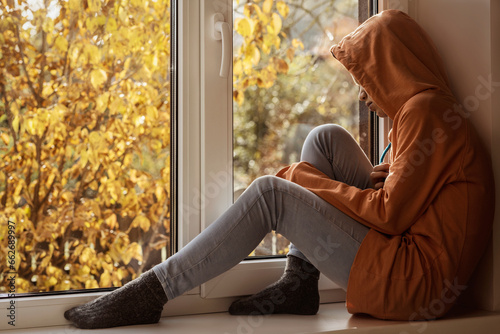 Stressed Teen Girl. Lonely Sad Depressed Teenager Need Help. Mental Health Problems. Expert Support Teenager. Autumn Depression Concept. © Maryana