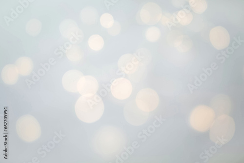 Abstract festive grey background on the theme of Christmas or New Year with bokeh in blurry focus. photo