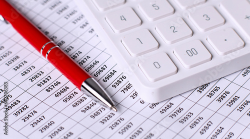Business chart, calculator and pen. Business concept