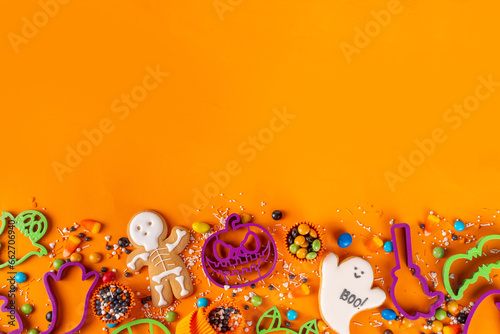 Bright colorful Halloween cookies and sweet background