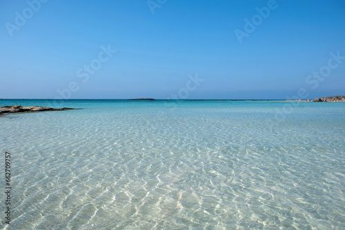 Elafonisi beach, Crete island Greece. Pink sand, shallow calm water, summer destination.
