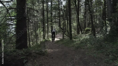 Drone MTB Forward Traveling on Trail photo