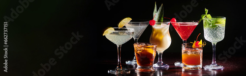 Photography set of zesty cocktails with fresh decorations on black background, concept, bann