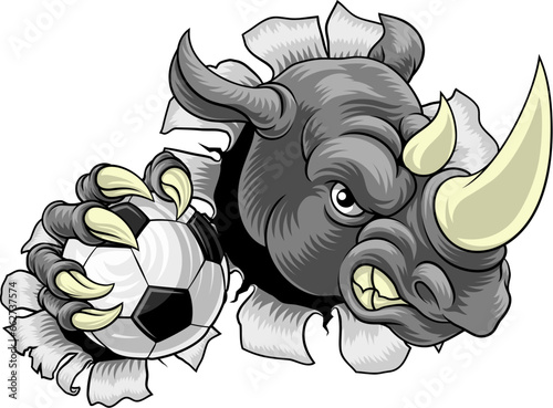 A rhino or rhinoceros cartoon sports mascot holding a soccer football ball