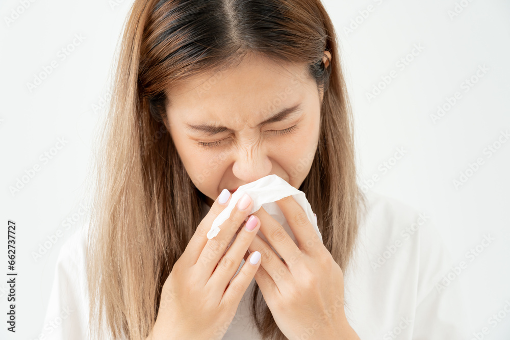 sick asian woman with a headache, beautiful female sneezing and runny nose with seasonal influenza, allergic, high fever and influenza, resting, virus, coronavirus, feel illness, respiratory sick asian woman with a headache, beautiful female sneezing and runny nose with seasonal influenza, allergic, high fever and influenza, resting, virus, coronavirus, feel illness, respiratory