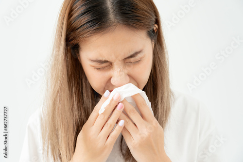 sick asian woman with a headache, beautiful female sneezing and runny nose with seasonal influenza, allergic, high fever and influenza, resting, virus, coronavirus, feel illness, respiratory