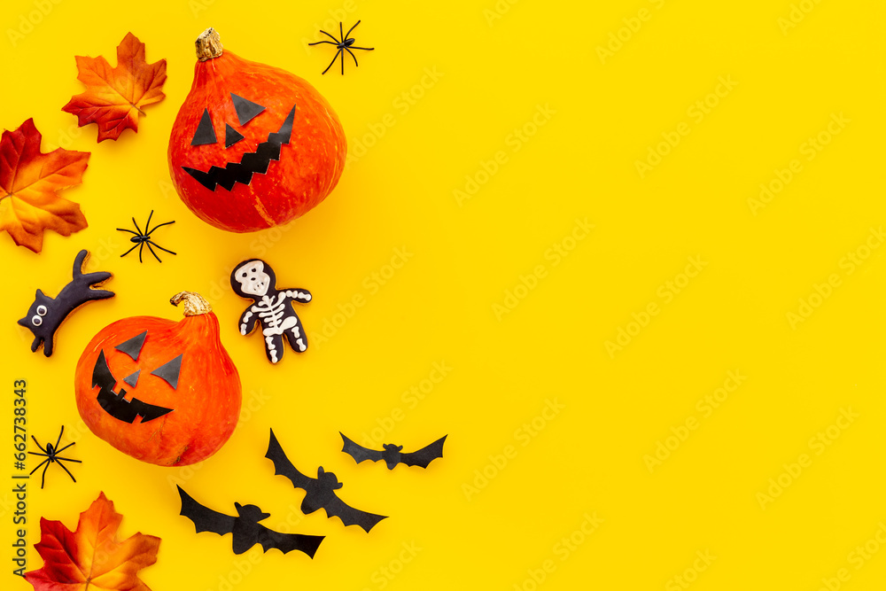 Festive Halloween decoration with pumpkin head and black bats Festive Halloween decoration with pumpkin head and black bats