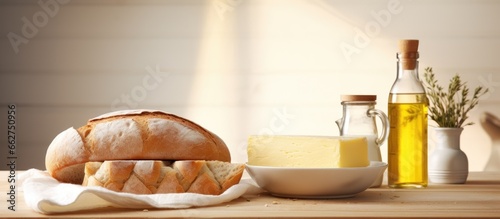 Kitchen table with bread and butter With copyspace for text photo