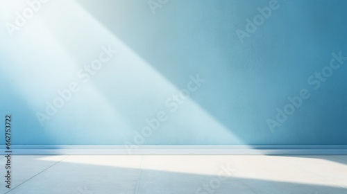 Universal background for presentation in light blue tones. Textured empty wall with sun highlights and shadows