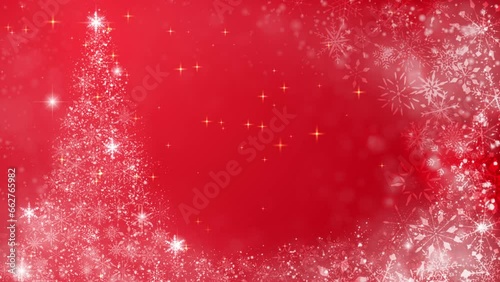 クリスマスツリーとキラキラ光るパーティクル、赤背景
