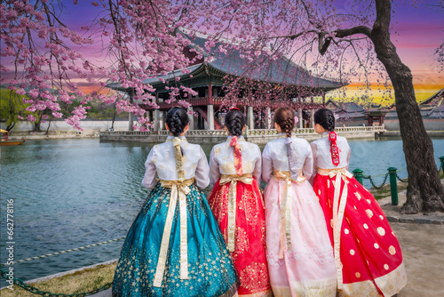 Cherry Blossom with Korean national dress at Gyeongbokgung Palace Seoul, South Korea.