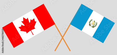 Crossed flags of Canada and Guatemala. Official colors. Correct proportion