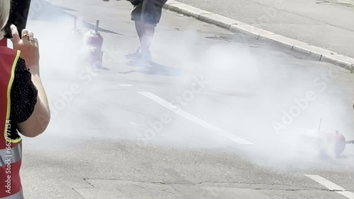 Protesters' Outcry: The Powerful Statement Made with Exploding Bottles and Blunt Force in the Midst of a Rally photo