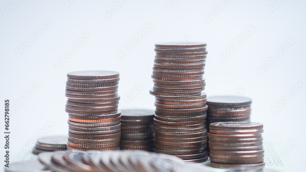 coins stacked on each other in different positions. Close-up money and currency.Savings, investments, marketing, funds, business concept. coins stacked on each other in different positions. Close-up money and currency.Savings, investments, marketing, funds, business concept.