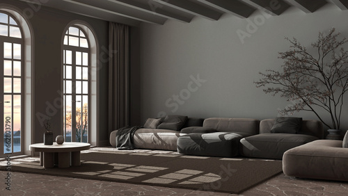 Dark late evening scene, contemporary living room. Velvet sofa and carpet. Stone floor, arched windows and vaulted ceiling. Minimalist interior design