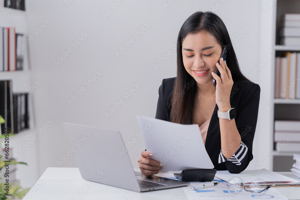 Business Documents concept : Employee woman hands working in Stacks paper files for searching and checking unfinished Business Documents concept : Employee woman hands working in Stacks paper files for searching and checking unfinished