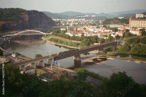 Usti nad Labem, Czechia - June 20, 2023: view of the train on the Elbe bridge - analog
